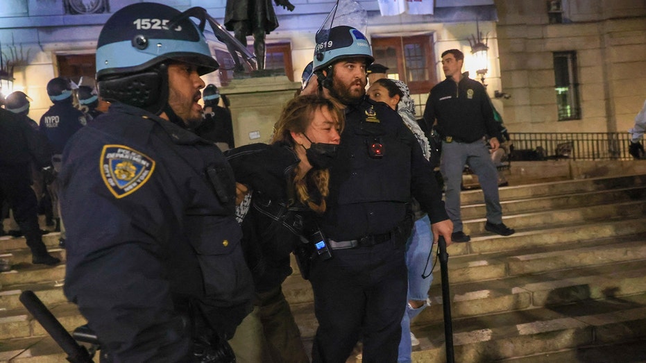 NYPD-officers-remove-anti-Israel-agitator.jpg